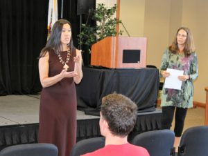 CCCC Director Deanna Campbell welcomes recipients of the ICSOS Community Star Awards to the Cerro Coso Community College Campus Large