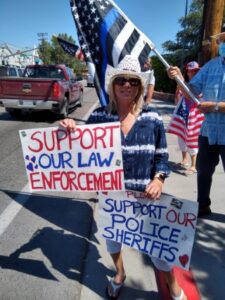 Sharon Sears RN was pro actively supporting police and cheerleading the effort from the side of the road to well in the middle of the street Phone