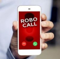 robocall hand holding cell phone