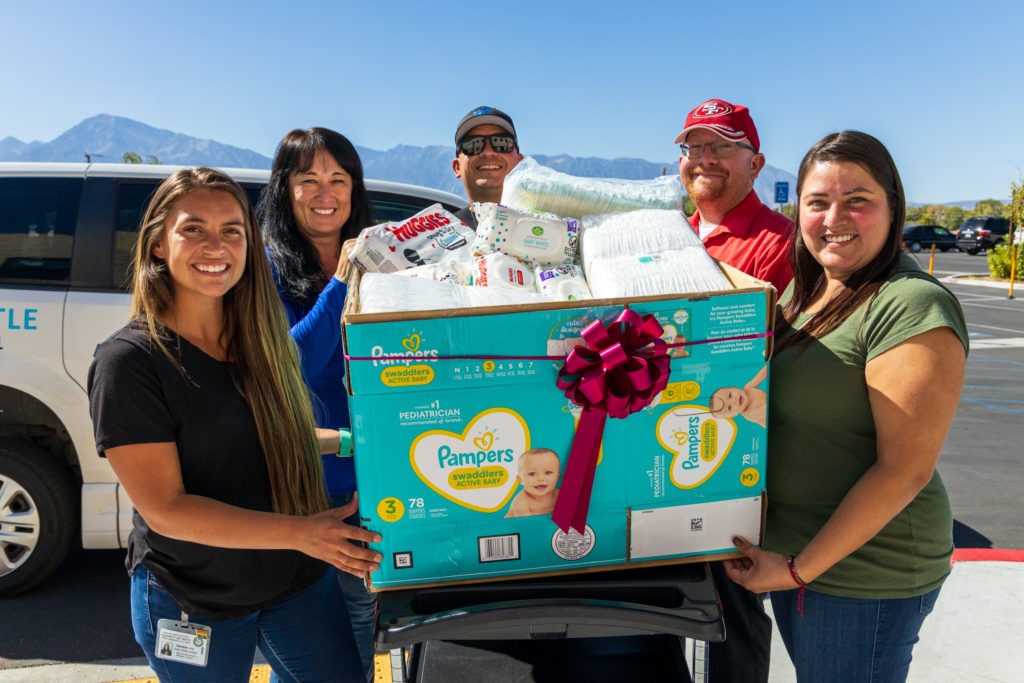COMMUNITY REPORT NIHD Employees Give Diaper Depot a Boost Sierra